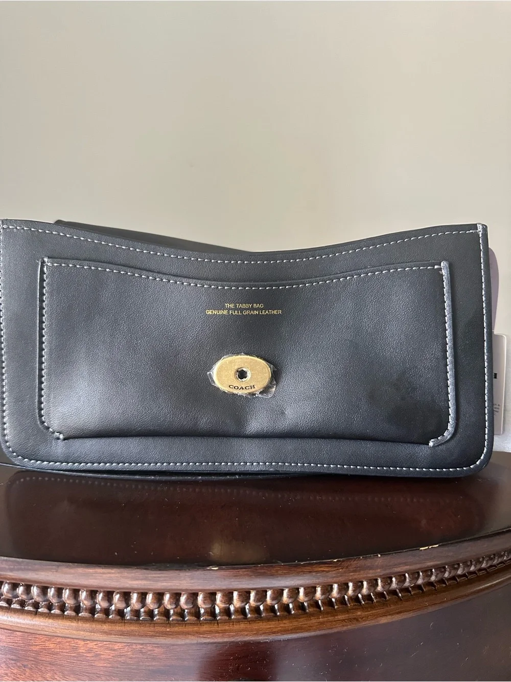 Coach Black Leather Shoulder Bag with Gold 'C' Accent
